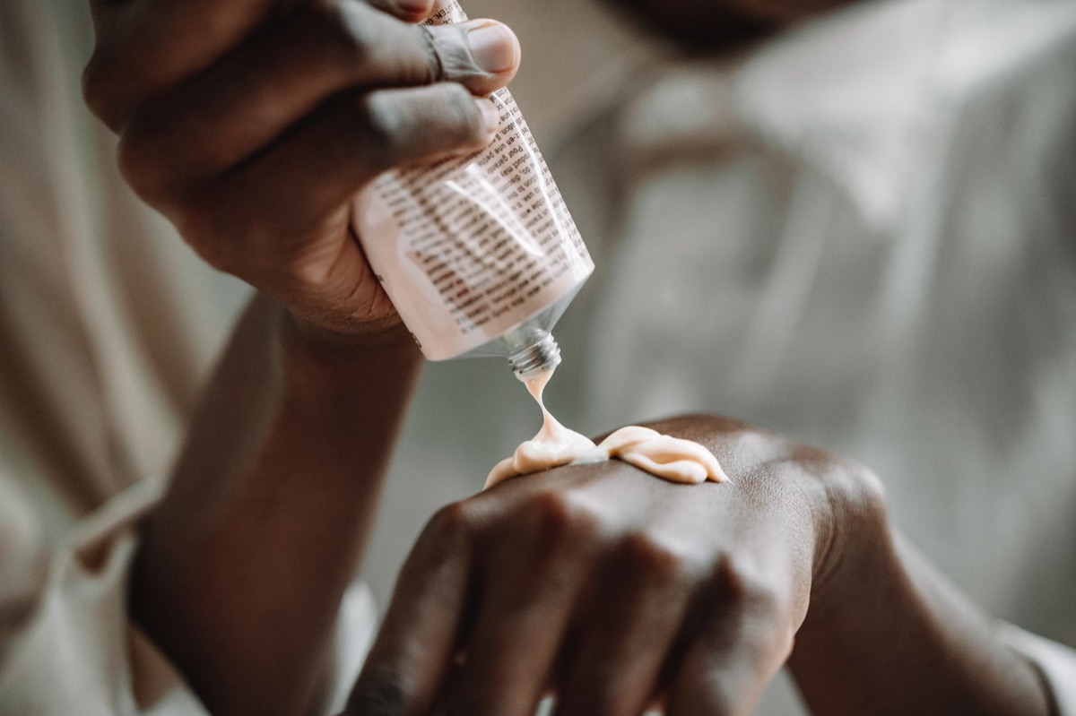 Close up of moisturizing hand cream being applied to skin.